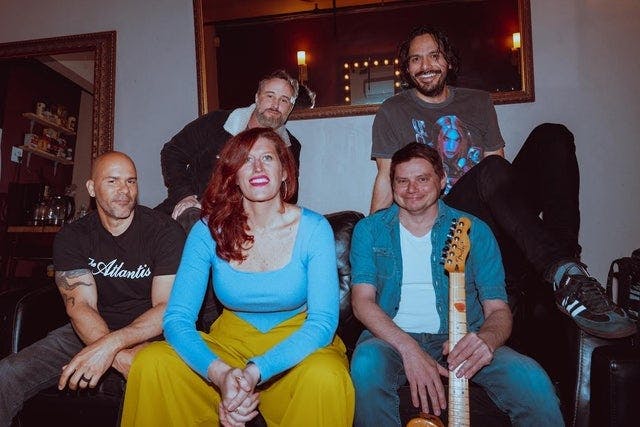 White Ford Bronco: DC's All '90s Band